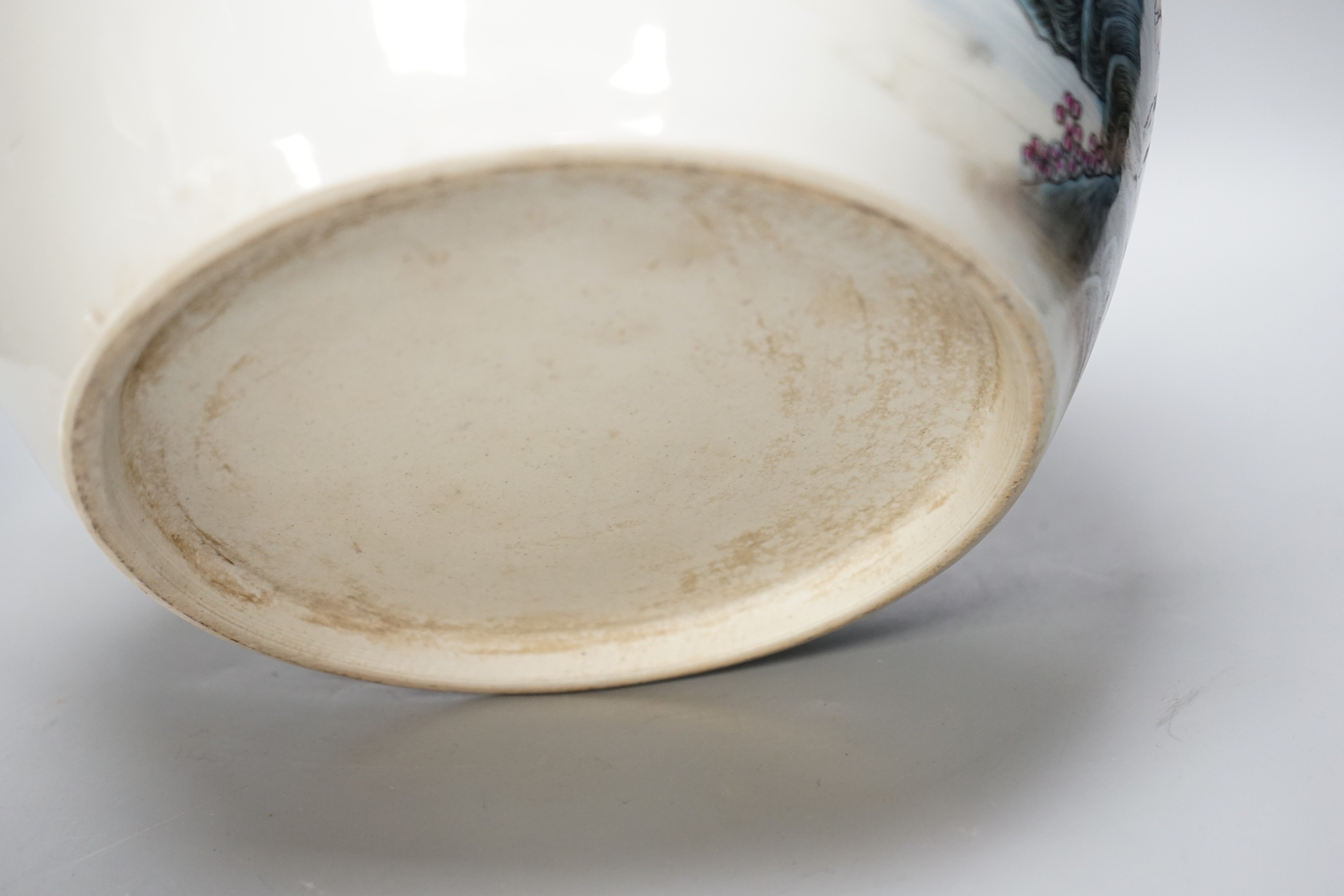 A large Chinese famille rose bowl and cover with mountainous landscape, 34cm tall